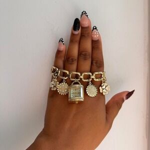 GOLD TONE STRADA QUARTZ CHARM WATCH‎